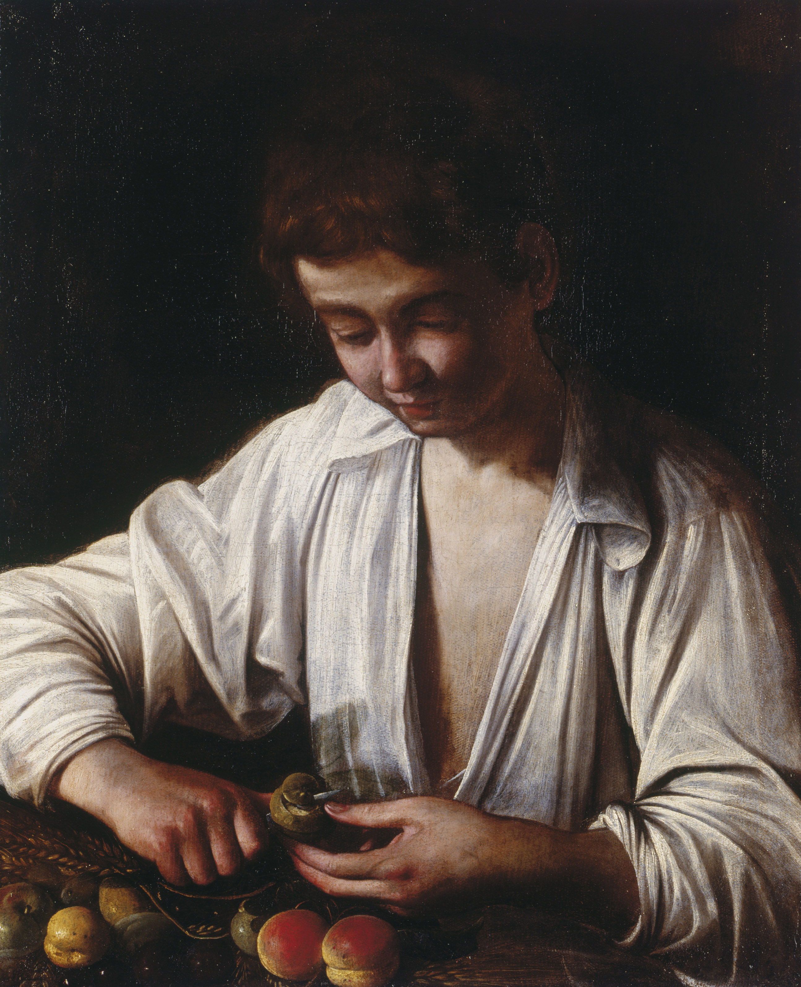 Boy Peeling Fruit by Caravaggio