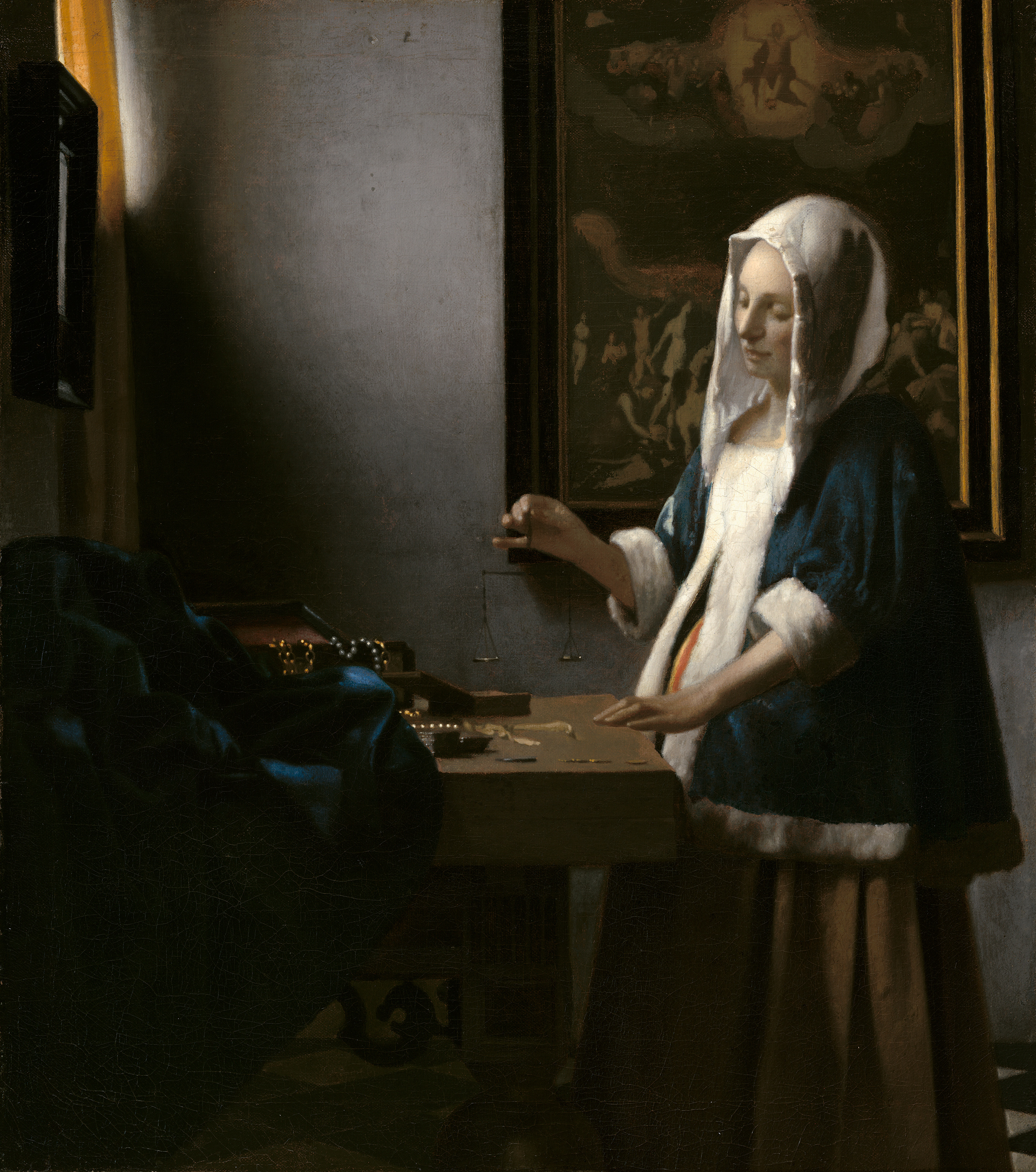 Woman Holding a Balance by Johannes Vermeer