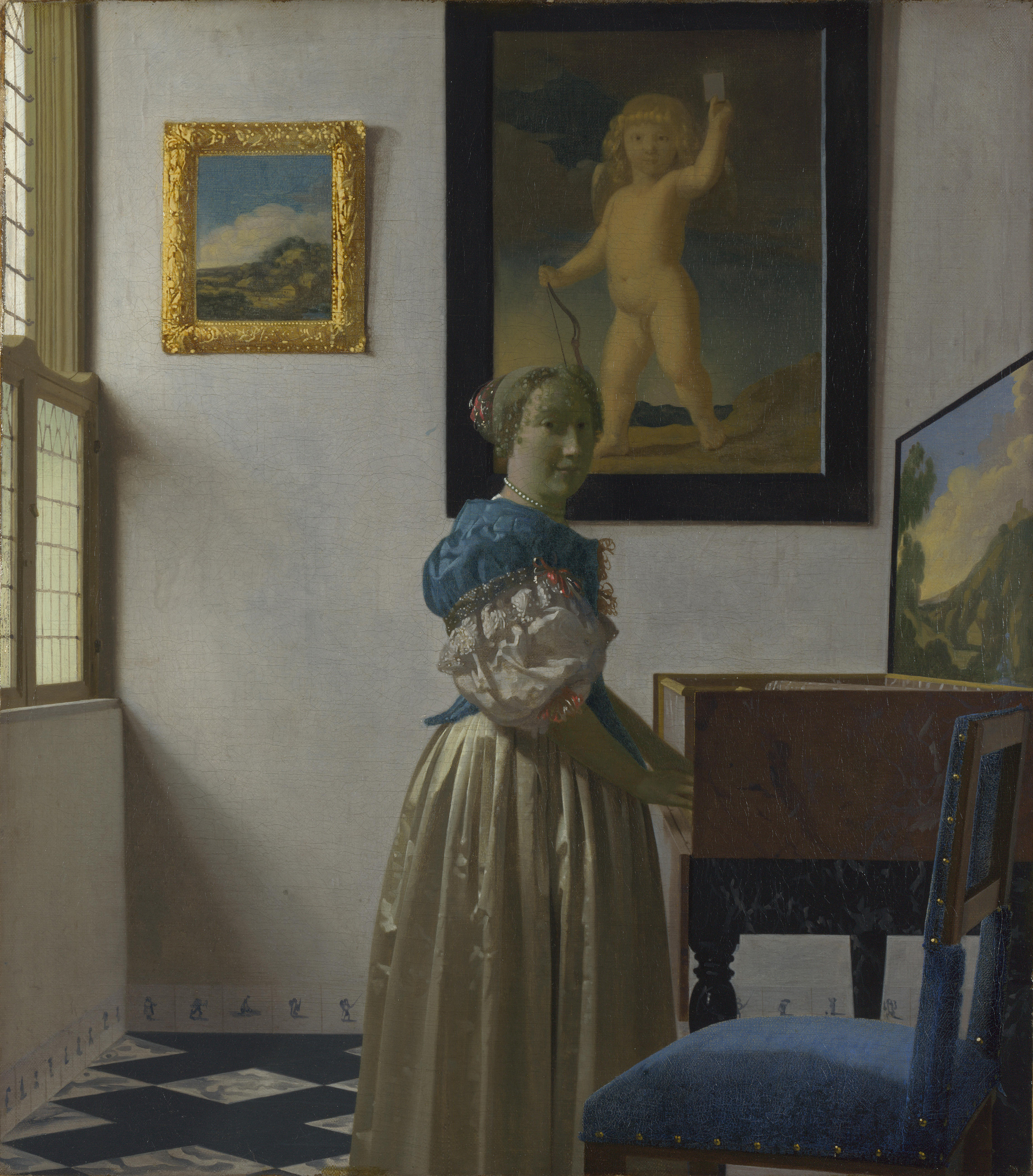 Young Woman Standing at a Virginal by Johannes Vermeer