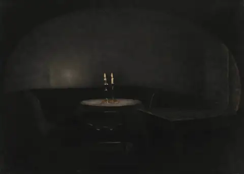 Interior, Artificial Light by Vilhelm Hammershøi